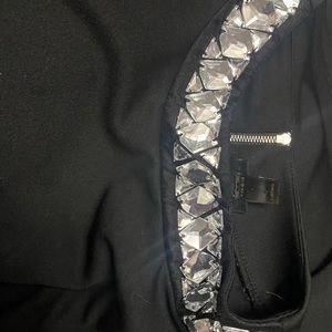 Sleeveless top with crystals neckline, zipper in the back. Worthington woman